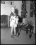 Photograph: [Little boy with dog]