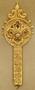 Thumbnail image of item number 1 in: '[Gold pendant that has a long stem and a round portion at the end]'.