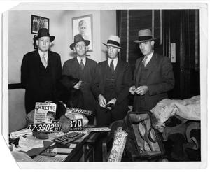 Primary view of object titled '[Dallas County Sheriff's Department With Items from Clyde Champion Barrow's Car]'.