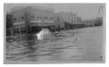 Photograph: [Men in Flooded Street]