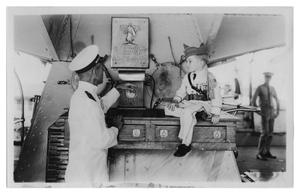 Primary view of object titled '[Man and Boy on Warship]'.