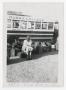 Primary view of [Photograph of Woman Outside McMurry College Bus]