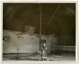 Photograph: [Firefighter Standing in Lot Behind Superior Bowling Lanes]