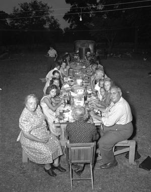 Primary view of object titled '[Caruso Family at a Table]'.