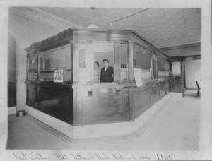 Primary view of object titled '[View from outside the teller windows at First National Bank in Richmond]'.