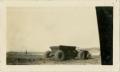 Primary view of [Tractor Pulling Dirt-Hauling Trailer]