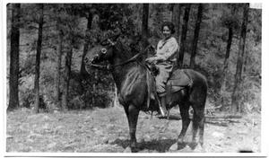 Primary view of object titled '[Loula Bunton on Horseback, 1909]'.