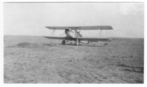 Primary view of object titled '[Airplane in Field]'.
