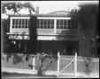 Photograph: [Gate in front of the George Ranch house]