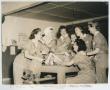 Photograph: [Seven WASP Gathered Around a Table]