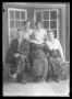 Photograph: [Family by Large Window]