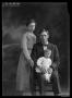 Photograph: [Portrait of Young Couple with Baby]