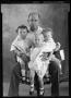 Photograph: [Portrait of a Man and Three Babies]