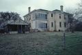 Photograph: [Baker House, (oblique, S elevation including milkhouse)]