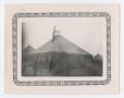 Photograph: [Photograph of Private John F. Creamer Breaking Down a Tent]
