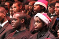 Photograph: [Choir members wearing Santa hats]