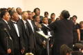 Photograph: [Conductor leading the choir]