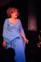 Thumbnail image of item number 1 in: '[Actress in blue dress singing on stage]'.