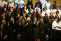 Photograph: [Choir members on stage]