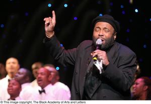 Primary view of object titled '[Andraé Crouch Performing]'.