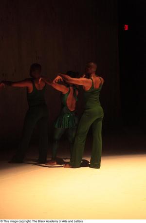 Primary view of object titled '[Photograph of three dancers from the Stella Maris Dance Ensemble lined up]'.