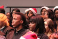 Photograph: [Choir members focusing]