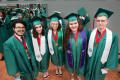 Photograph: [Graduating Students Taking Photos Together]