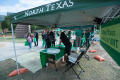 Thumbnail image of item number 1 in: '[Booth at UNT Grad Block Party]'.