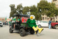Photograph: [Scrappy rides on cart in Homecoming Parade]