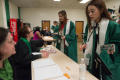 Photograph: [Undergraduate Students Checking In At Their Commencement Ceremony]