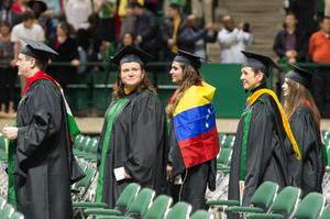 Primary view of object titled '[Master Graduate Students in line at their Commencement Ceremony]'.