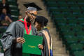 Photograph: [Mayborn Graduate showing diploma]