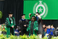 Photograph: [Ph.D Candidate Being Presented with Doctoral Hood, 2]