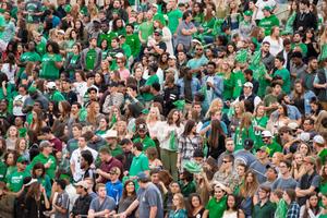 Primary view of object titled '[Mean Green Student Section at Homecoming Game]'.