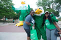Photograph: [Students pose with Scrappy at UNT Grad Block Party]