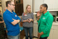 Primary view of [Dorothy Bland Talking With Two Former UNT Students]