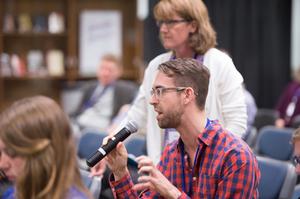 Primary view of object titled '[A Young Man Asking Conference Attendees A Question]'.