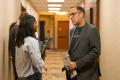Primary view of [Mike Wilson and Tanya Raghu interacting in hallway]