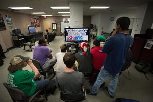 Primary view of object titled '[Students playing Super Smash Brothers]'.