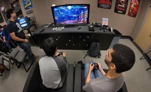 Primary view of object titled '[Students playing video games during International Game Day event]'.