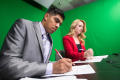 Thumbnail image of item number 1 in: '[NT Daily TV anchors take notes on script]'.