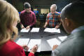 Thumbnail image of item number 1 in: '[NT Daily TV team looking over scripts]'.
