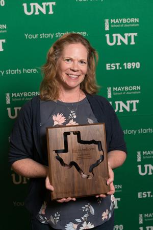 Primary view of object titled '[Kim Horner with first place plaque]'.