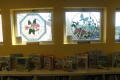 Thumbnail image of item number 1 in: '[Stained glass windows inside library]'.