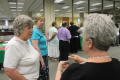Photograph: [CSLA guests standing in line for lunch buffet]