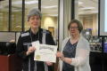 Primary view of [Jane Hope accepting certificate for Houston Texas Chapter]
