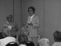 Primary view of [Alrene Hall and Jane Hope speaking to attendees]