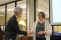 Primary view of [Jane Hope shaking hands with Marcia Trauernicht]