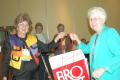 Primary view of [Attendees holding up bag]