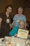 Photograph: [Caroline B. Cooney holding up award 2]